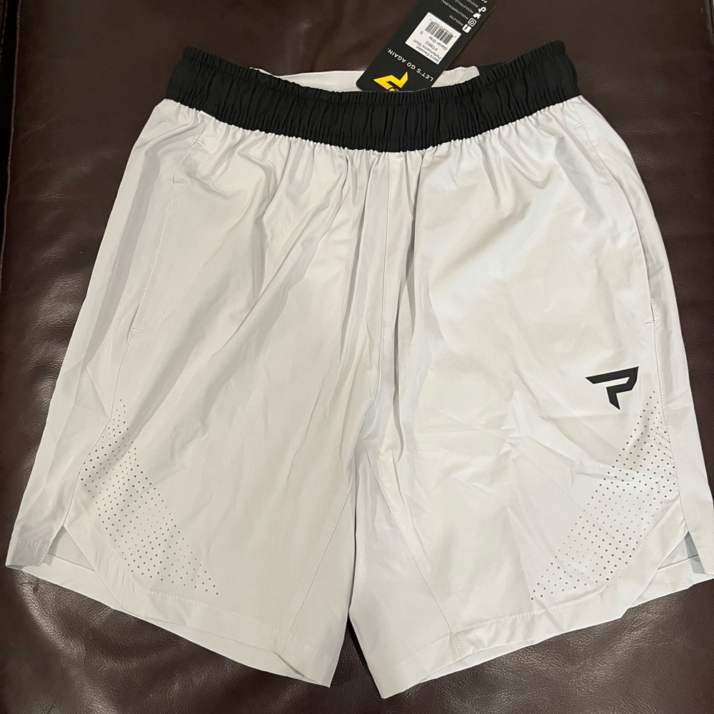 Paddletek Men’s Performance Shorts. Brand new. Glacier grey. Size small.